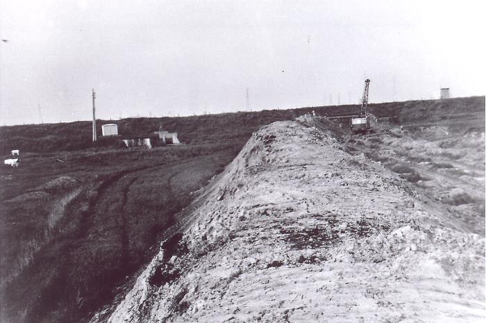 Opspuitingsdijk in de Kom te Kallo